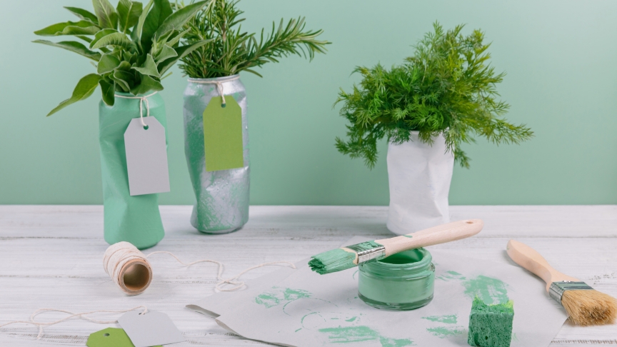 DIY plant pots, green paint and a used paint brush