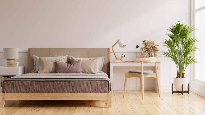 A modern, minimalistic bedroom decorated with beige tones