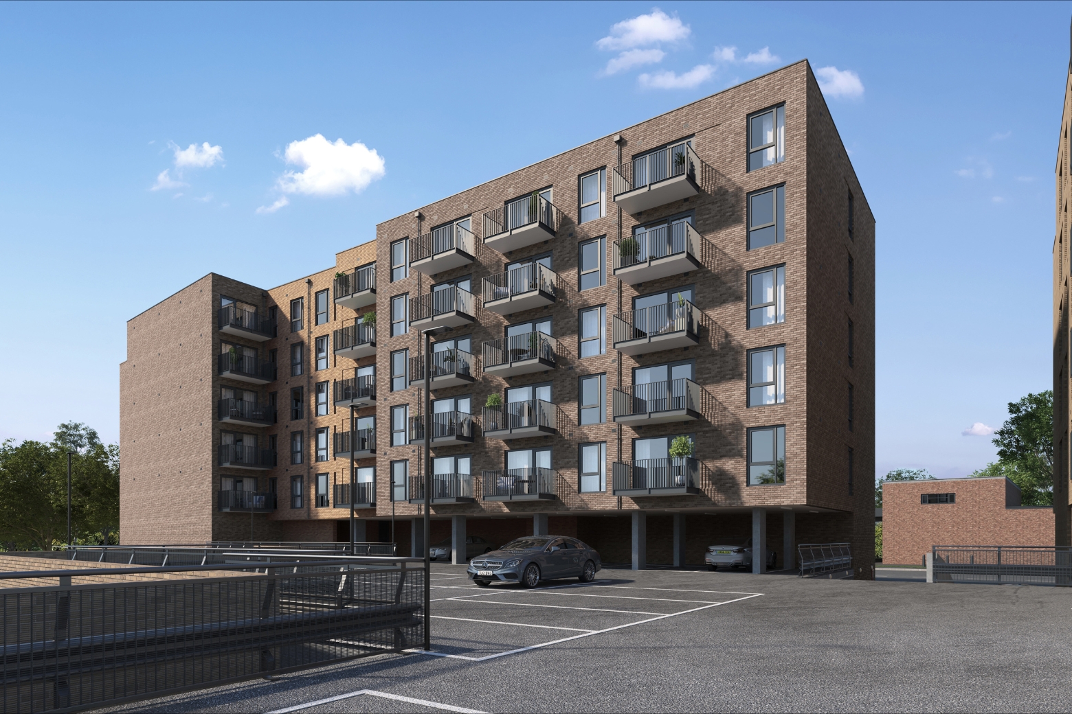 A large purpose built apartment building with balconies 