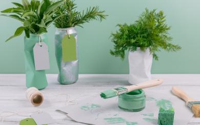 DIY plant pots, green paint and a used paint brush