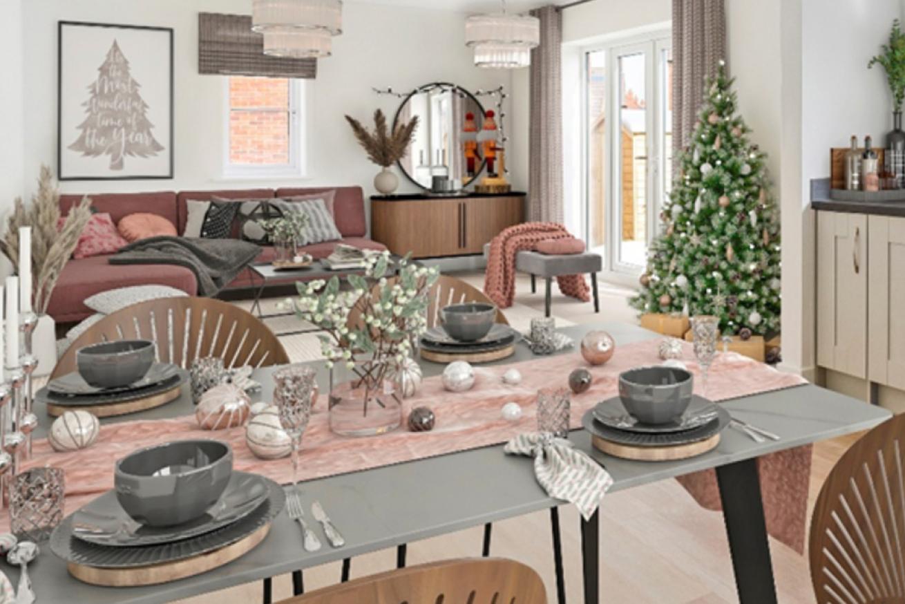 A neutrally decorated dining and living area with a Christmas tree